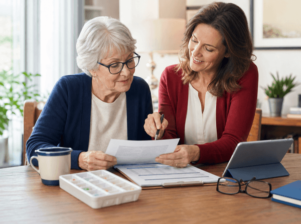 Senior adult reviewing health coverage options with an advisor